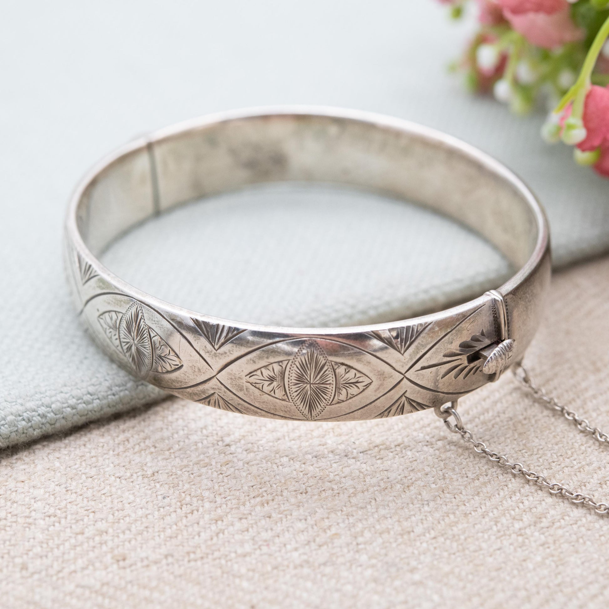 Vintage Sterling Silver Floral Engraved Bangle Bracelet 1966 - Chunky Victorian Aesthetic Scrolling Style with Safety Chain