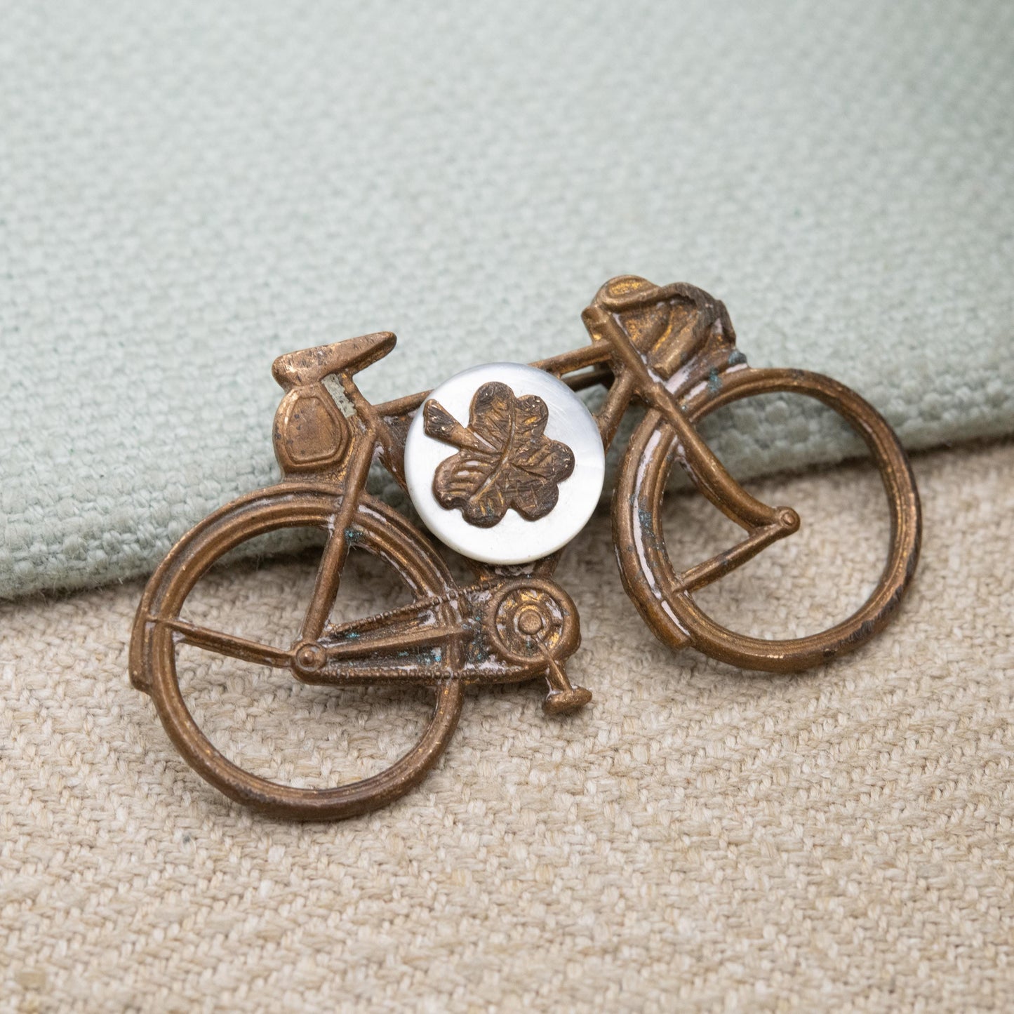 Antique Bicycle Brooch with Mother of Pearl Shamrock c. 1920s Made in England