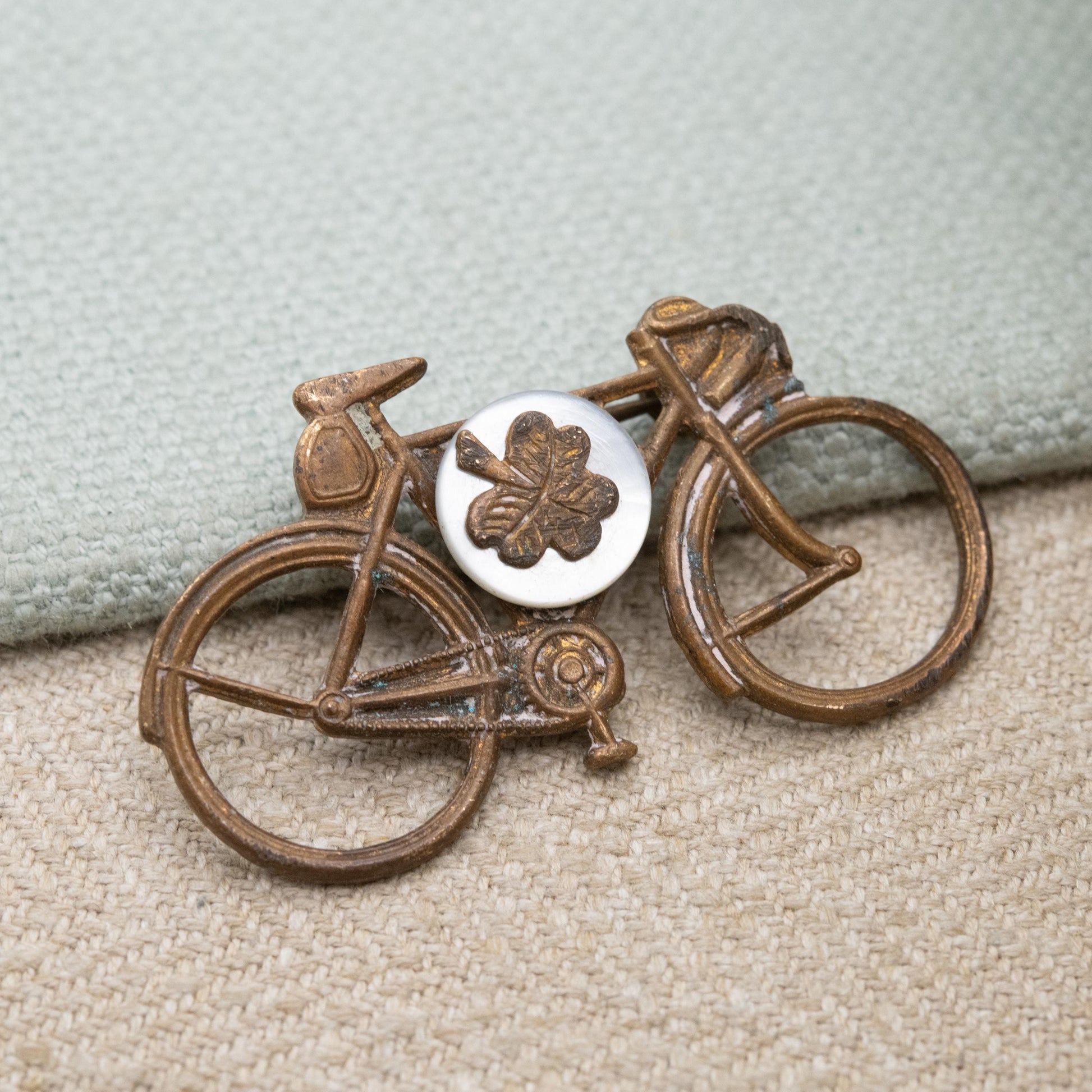 Antique Bicycle Brooch with Mother of Pearl Shamrock c. 1920s Made in England