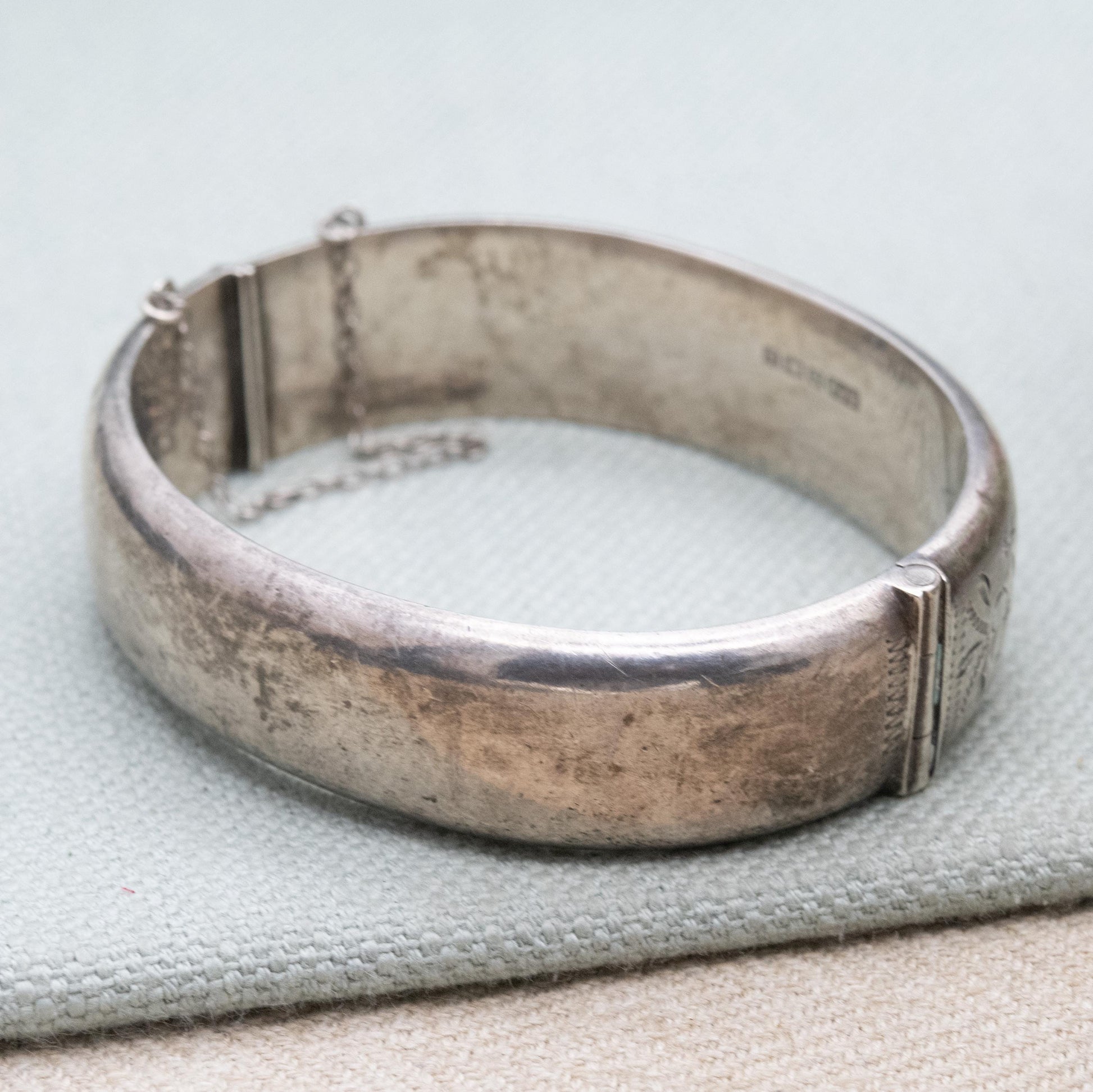 Vintage Sterling Silver Engraved Bangle Bracelet 1969 - Chunky Victorian Aesthetic Scrolling Style with Safety Chain
