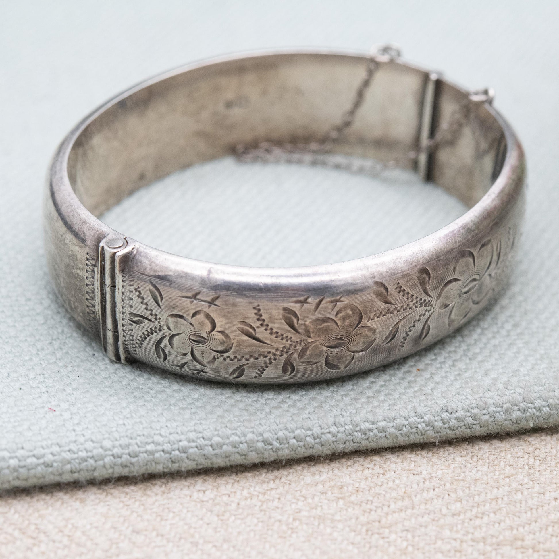 Vintage Sterling Silver Engraved Bangle Bracelet 1969 - Chunky Victorian Aesthetic Scrolling Style with Safety Chain