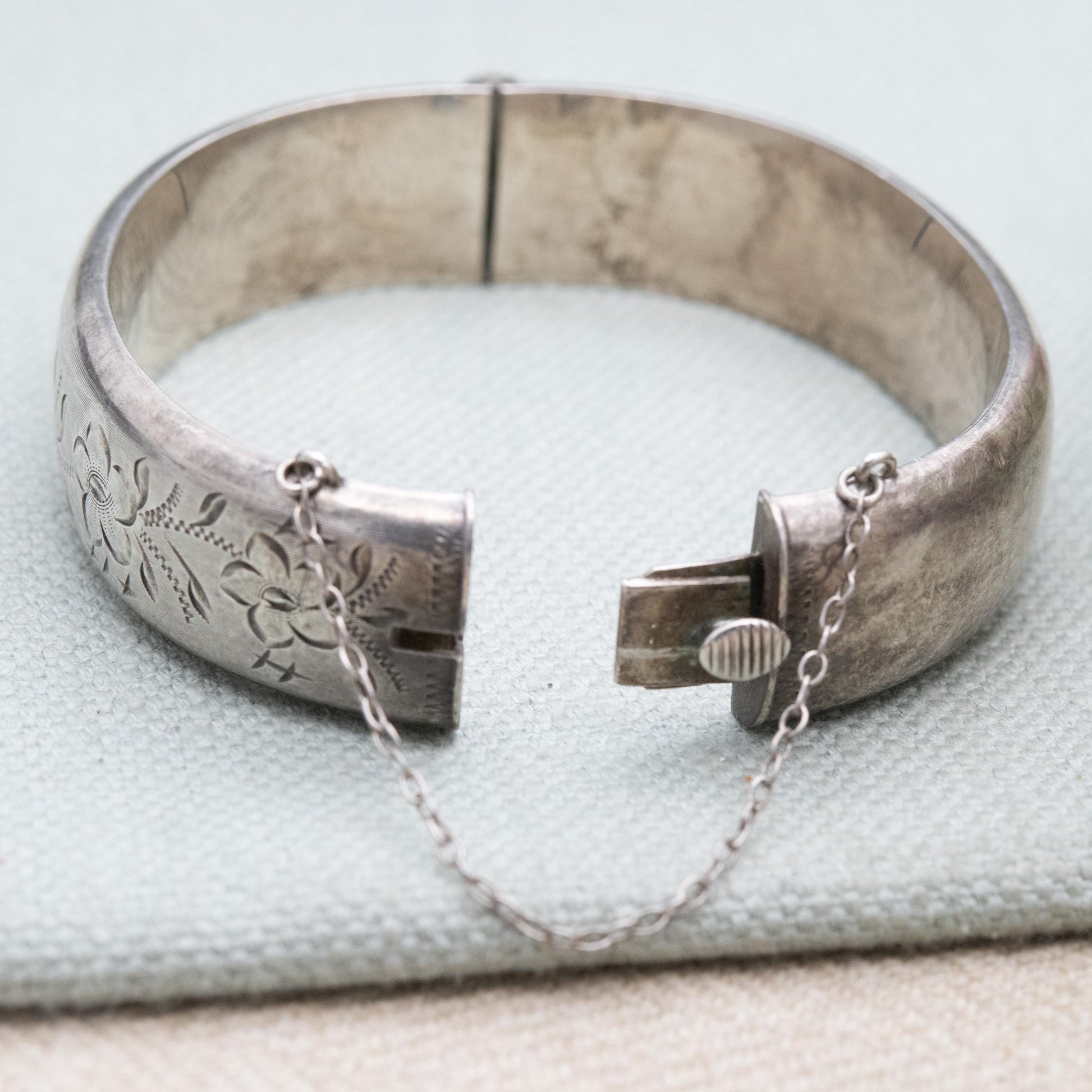 Vintage Sterling Silver Engraved Bangle Bracelet 1969 - Chunky Victorian Aesthetic Scrolling Style with Safety Chain