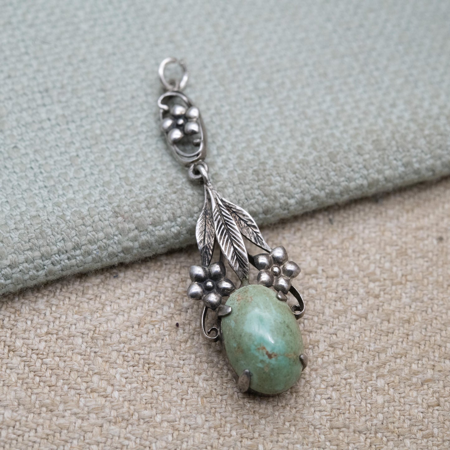 Antique Arts and Crafts Silver Flower Pendant with Green Cabochon Stone c. 1910s