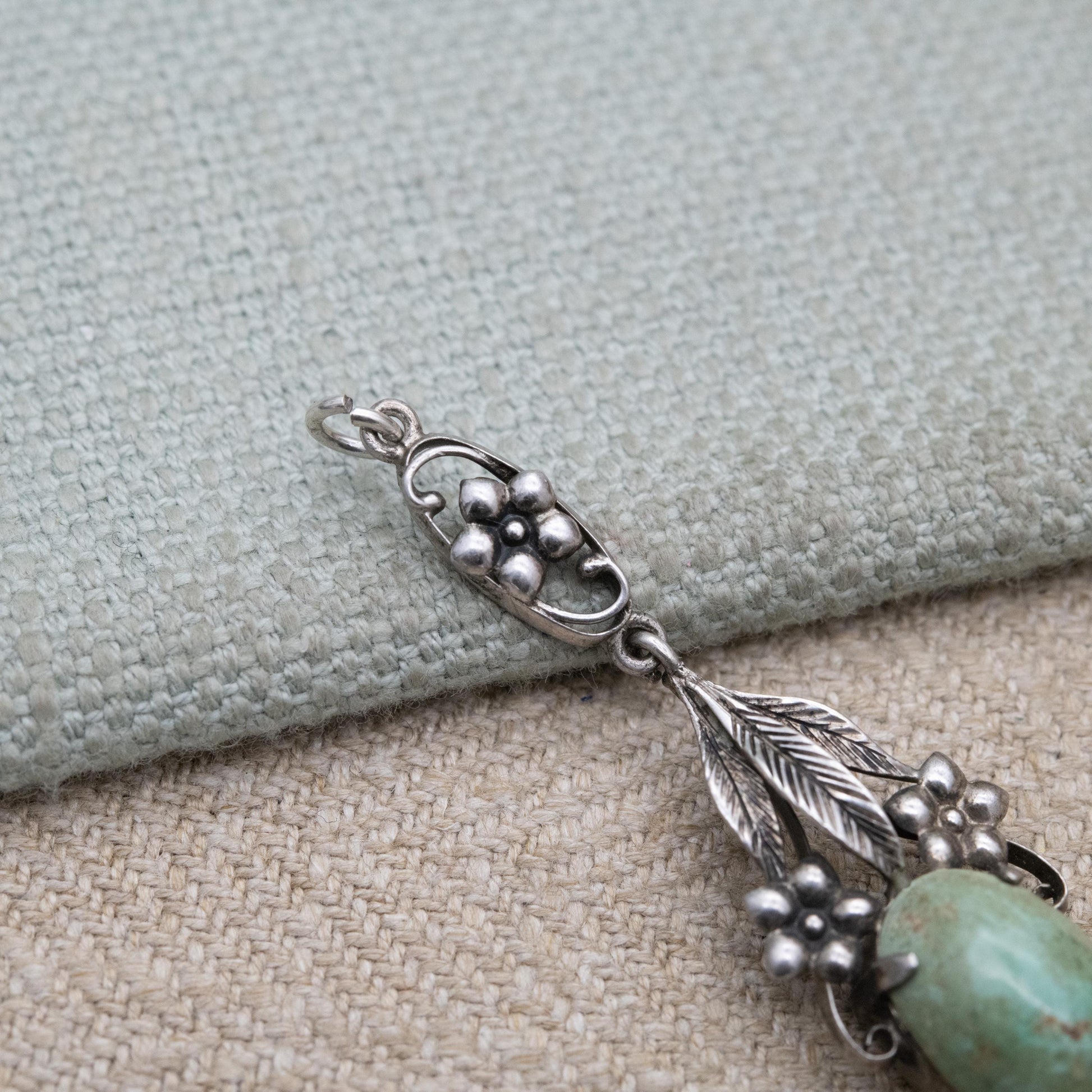 Antique Arts and Crafts Silver Flower Pendant with Green Cabochon Stone c. 1910s