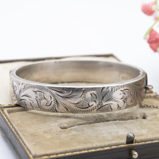 Vintage Sterling Silver Floral Engraved Bangle Bracelet 1976 - Chunky Victorian Aesthetic Scrolling Style with Safety Chain