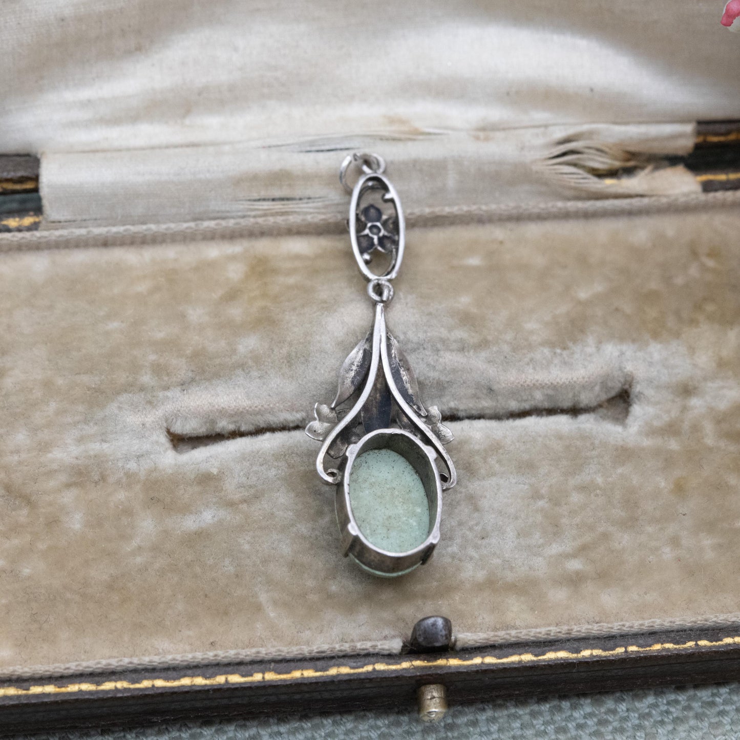 Antique Arts and Crafts Silver Flower Pendant with Green Cabochon Stone c. 1910s