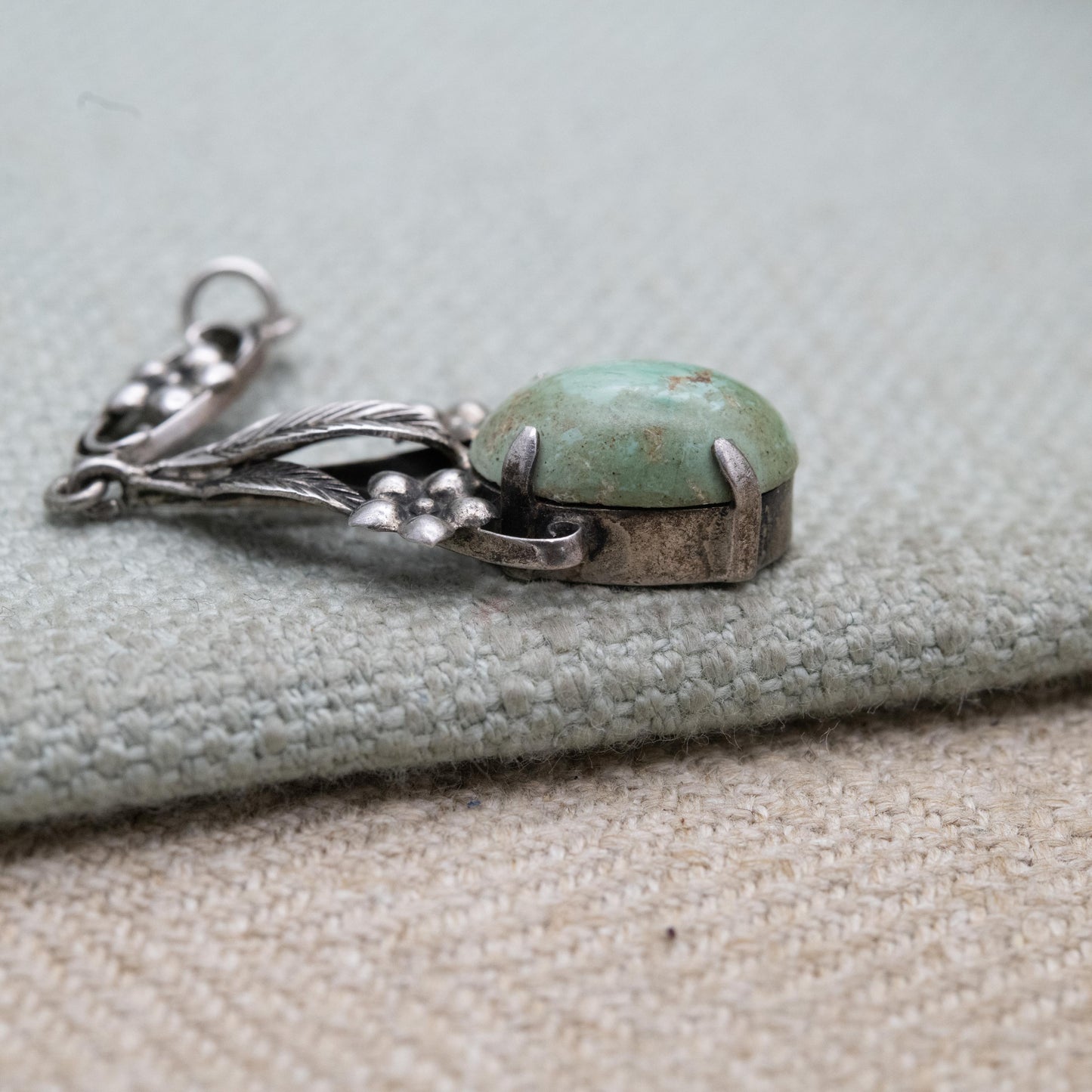 Antique Arts and Crafts Silver Flower Pendant with Green Cabochon Stone c. 1910s